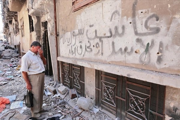 “Assad or we burn the country” graffiti spraypainted by regime loyalist forces in Homs, roughly 2013