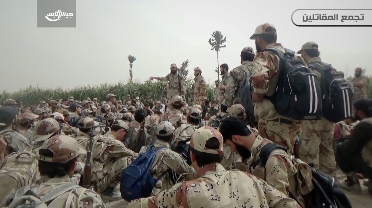 Jaish al-Islam fighters wearing standardized hats, uniforms and boots