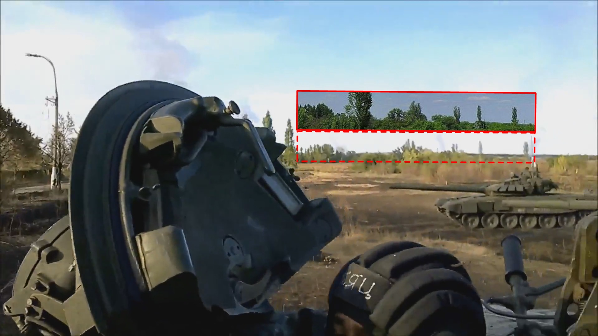 The same line of trees, visible in the video of the 200th Brigade at the Luhansk Airport, looking northeast