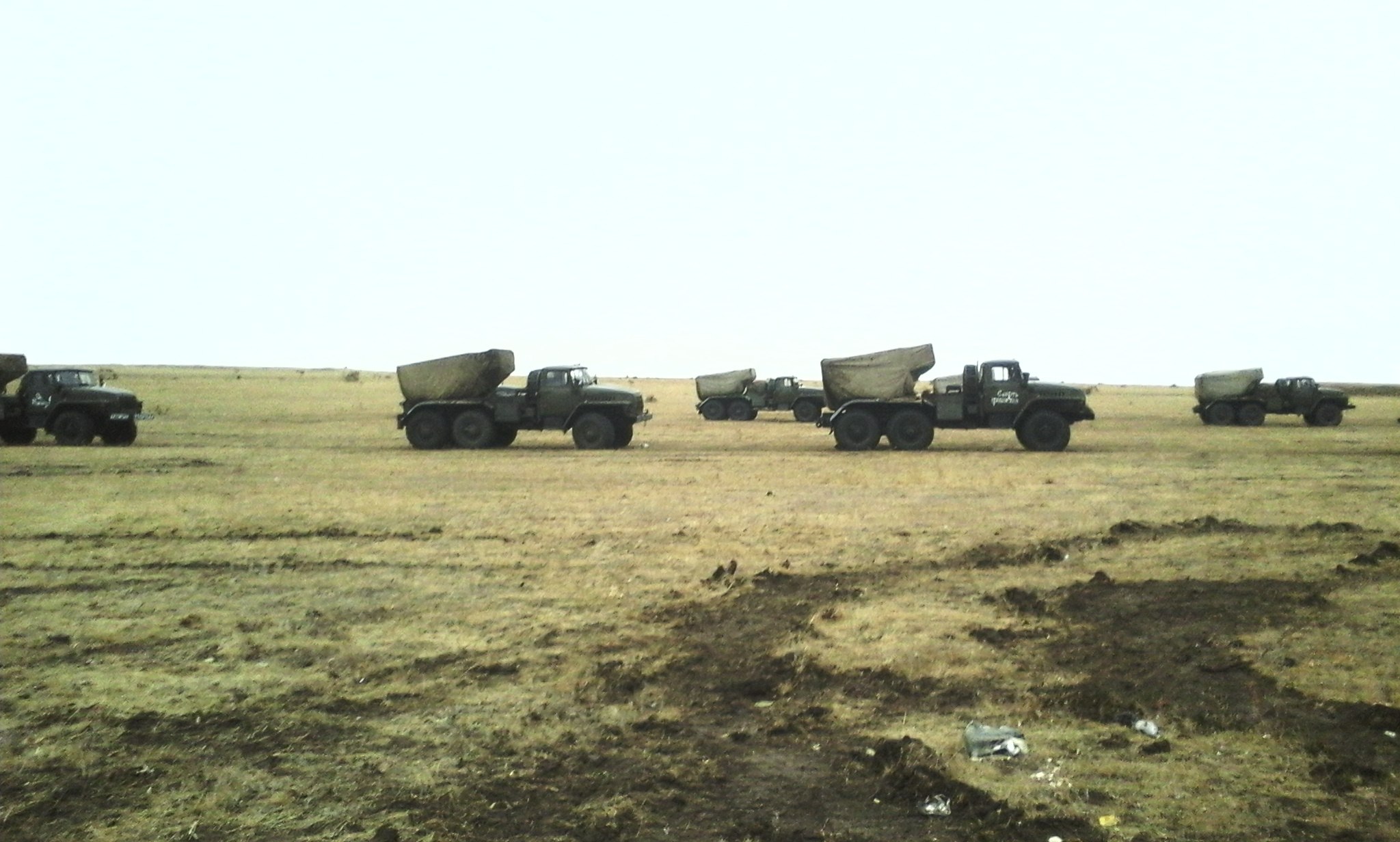 Two different MLRS BM-21 Grads with identical "Death to fascists" phrases on the right side. The photographs are from the aforementioned Nikolai Dugaev.