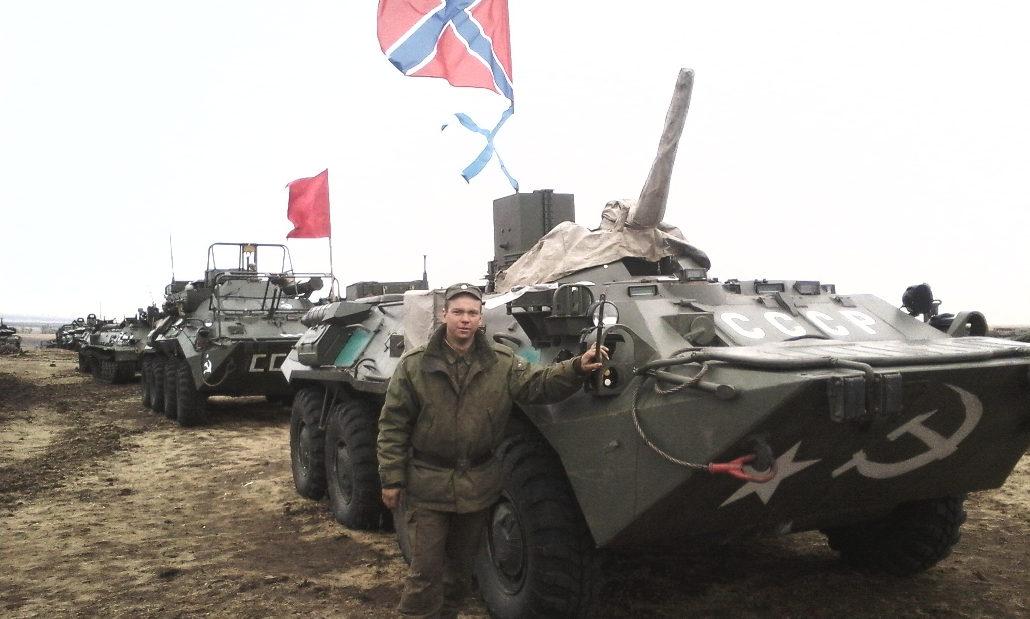 Photograph from the account of Nikolai Dugaev, showing military equipment with the Russian naval ensign and naval jack. This is not the same as the flag of Novorossiya.