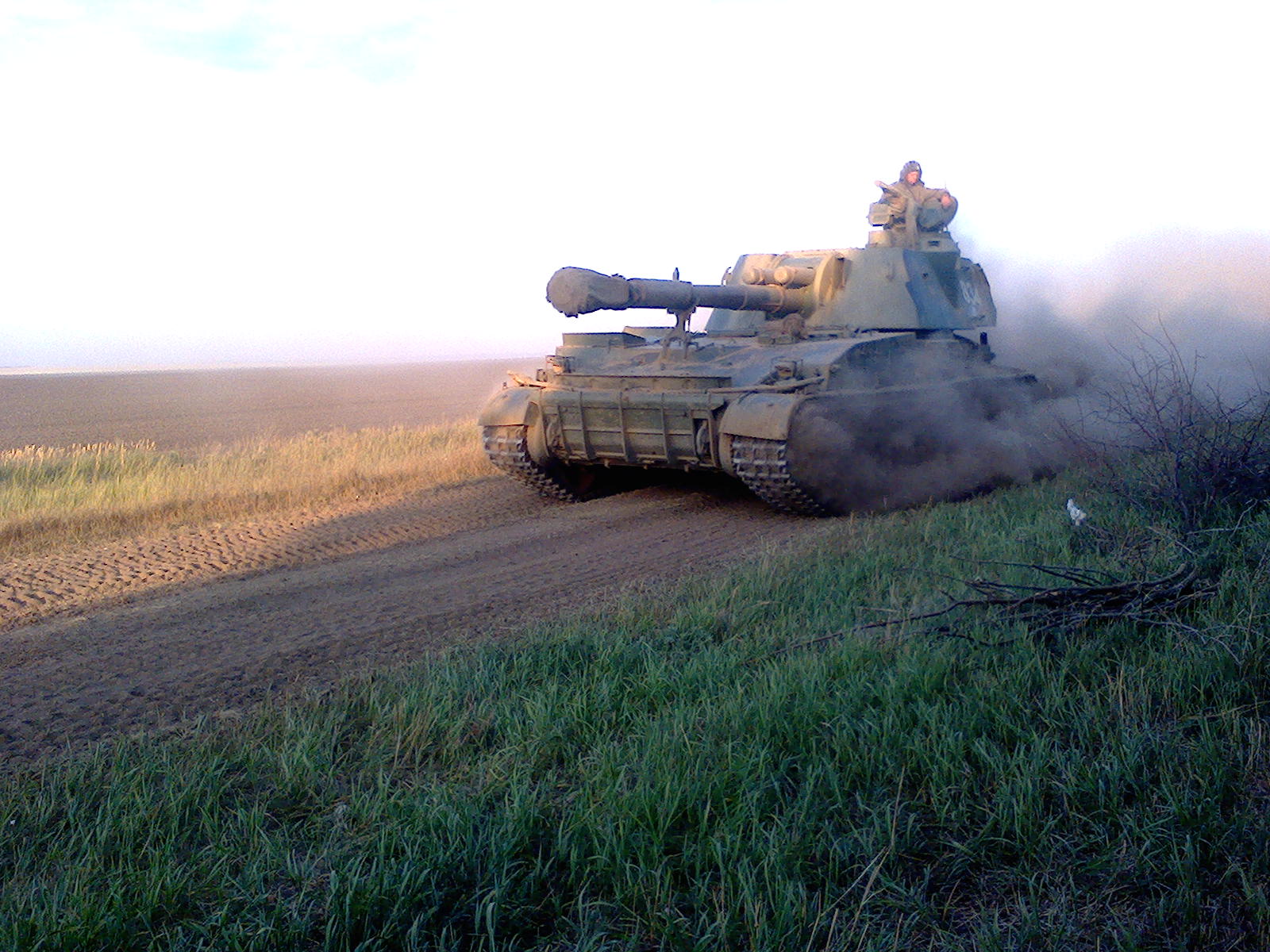 Self-propelled artillery 2S3 Akatsiya with the number 834 and the inscriptions: "Stalin's Fist" on the barrel, "Don't make a noise or I'll come for you" on the right side, "Death to Fascism" and a yellow triangle on the left side. Archive / Original