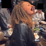 Image of Isabel dos Santos eating steak.